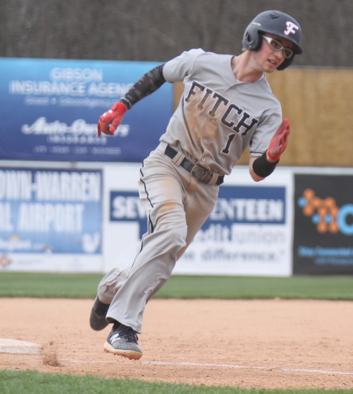 William D. Lewis The Vindicator  Fitch's Vinny Direnzo(1) rounds thirds to score during 4-23-18 game with Howland at Eastwood.