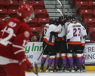 Youngstown Phantoms' players celebrate a goal during their hockey game against the Dubuque Fighting Saints at Mystique Community Ice Center in Dubuque on Tuesday, April 24, 2018.
