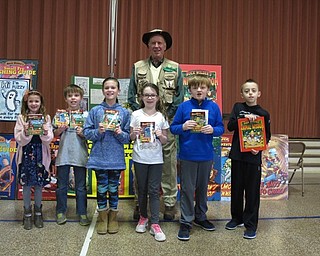Neighbors | Zack Shively.Tim Smith, author of the "Buck Wilder" series of children's books, visited Dobbins Elementary on March 19. He spoke to the students about being an author and trying new things.
