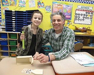 Neighbors | Zack Shively.Dobbins Elementary had a father daughter night on March 20. The night included a series of different stations, including one where the child and parent worked on a project together. Pictured, Sofia and Frank Elia work together to make a birdhouse.
