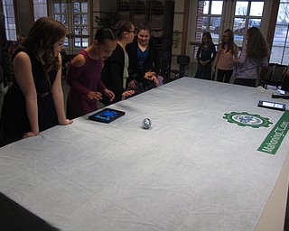 Neighbors | Zack Shively.The Dobbins Elementary PTO brought in female instructors and students from MCCTC's STEM program for their father daughter night. Pictured, the STEM students showed the daughters how to use a program to roll a ball around on a table.