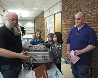 Neighbors | Zack Shively.The PTO brought in Dan Felger of Felger Exotics to show the children and parents some animals, such as a rabbit and a marmoset. The children pet the animals and talked to Felger while in line for their professional photo with Felger's kangaroo.