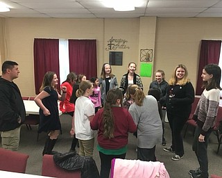 Neighors | Submitted .Sergeant Wade Boley of the Columbiana Police Department led members of Girl Scout Troops 80191 and 80777 in Columbiana and 80018 in Canfield in a Circle of Friends activity centered on character as it relates to standing up against bullying.