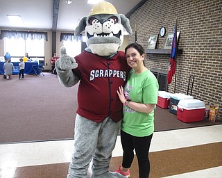 Neighbors | Zack Shively.Jessica Giancola, organizer of the Fitness Sunday Funday, has Crohn's disease and created the event to help fund the Crohn’s and Colitis Foundation to help find a cure. She said she hoped the event would also raise awareness for disease and how common it is. Pictured is Giancola with Scrappy.