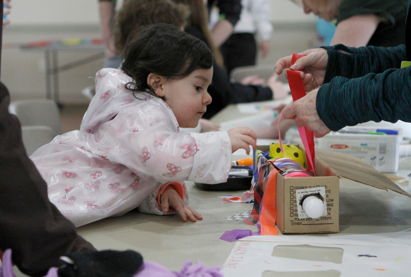 Mary Jane Katsaras (2) of Austintown picks out the color of tail she wants on her kite during the Kite Festival at the Mill Creek Metro Parks Farm in Canfield on Saturday morning.  

4/28/18

Dustin Livesay  |  The Vindicator  

Mill Creek Park