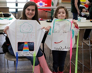 L-R) Emma (12) and her sister Josephine Bushling (5) of Boardman made their own kites during the Kite Festiival at the Mill Creek Metro Parks Farm in Canfield on Saturday morning.  

4/28/18

Dustin Livesay  |  The Vindicator  

Mill Creek Park