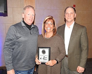 The GFWC Ohio Austintown Junior Women’s League recently hosted its annual scholarship fundraiser, “A Taste of Austintown.” More than 300 guests gathered at Immaculate Heart of Mary Church in Austintown to taste offerings from 18 local vendors. Judges included Bob Gavalier, Austintown police chief; Carole Rimedio-Righetti, Mahoning County commissioner; and Anthony Sertick, Youngstown Municipal Court magistrate. Austintown Pizza & Chicken won the People’s Choice Award for Best Taste, Rachel’s Restaurant & Catering won Judges’ Choice for the Best of the Best, and Hollywood Gaming won the People’s Choice Award for Best Presentation. More photos and information about the AJWL can be found on Facebook at AJWL2014. Above, from left, are Gavalier with Pam and Don Fowler of Austintown Pizza & Chicken. Below, from left, are Greg Morgione, Rachel’s Restaurant & Catering; Sertick; and Sean Phillips, also from Rachel’s.
