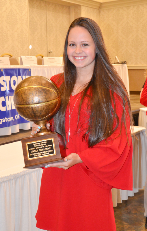 Emily Williams, from Jackson-Milton High School, holds her Curbstone Coaches Byrd Giampetro Student Athlete of the Year award at the Curbstone Coaches Basketball Recognition Banquet at the Our Lady of Mount Carmel Social Hall in Youngstown on Sunday, April 29, 2018.  

Photo by Scott R. Williams - The Vindicator