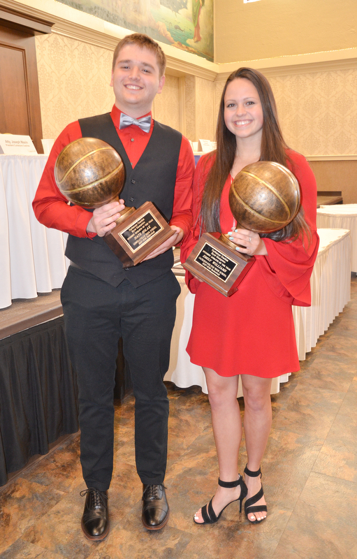 Nate Solak, from Lowellville High School, (left) and Emily Williams, from Jackson-Milton High School, hold their Curbstone Coaches Byrd Giampetro Student Athlete of the Year awards at the Curbstone Coaches Basketball Recognition Banquet at the Our Lady of Mount Carmel Social Hall in Youngstown on Sunday, April 29, 2018.  

Photo by Scott R. Williams - The Vindicator