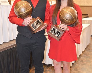 Nate Solak, from Lowellville High School, (left) and Emily Williams, from Jackson-Milton High School, hold their Curbstone Coaches Byrd Giampetro Student Athlete of the Year awards at the Curbstone Coaches Basketball Recognition Banquet at the Our Lady of Mount Carmel Social Hall in Youngstown on Sunday, April 29, 2018.  

Photo by Scott R. Williams - The Vindicator