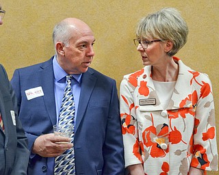 Ohio Supreme Court Justice Mary DeGenaro, right, chats with Barry Miner from Columbiana Country prior to the start of the Mahoning County Republican Party's Annual Abraham Lincoln Day Dinner held at The Maronite Center on Tuesday, May 1, 2018.  

Photo by Scott Williams - The Vindicator