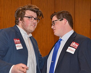 Young Republicans Tex Fischer, left, and Nick Cocca share a moment  prior to the start of the Mahoning County Republican Party's Annual Abraham Lincoln Day Dinner held at The Maronite Center on Tuesday, May 1, 2018.  

Photo by Scott Williams - The Vindicator