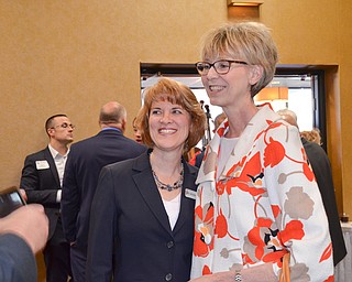 Ohio Supreme Court Justice Mary DeGenaro (right) and Kathleen Bartlett, 7th District Court of Appeals, share a moment prior to the start of the Mahoning County Republican Party's Annual Abraham Lincoln Day Dinner held at The Maronite Center on Tuesday, May 1, 2018.  

Photo by Scott Williams - The Vindicator