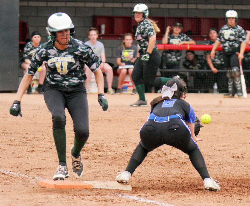 William D. Lewis The Vindicator  Ursuline's Destiny Goodnight(7) is safe at first as Lakeview's Olivia Kelm (6) waits for the throw during 5-2-18 action at YSU.