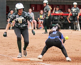 William D. Lewis The Vindicator  Ursuline's Destiny Goodnight(7) is safe at first as Lakeview's Olivia Kelm (6) waits for the throw during 5-2-18 action at YSU.