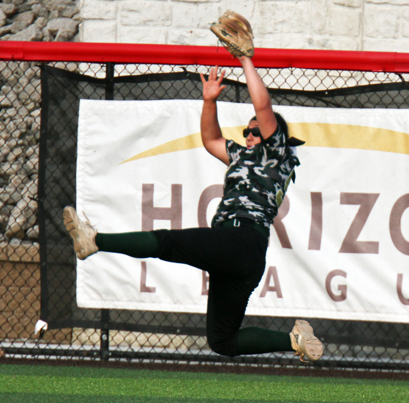 William D. Lewis The Vindicator  Ursuline's  Jordyn Kennally.(99) cathe a flyball during 5-2-18 win over Lakeview at YSU.