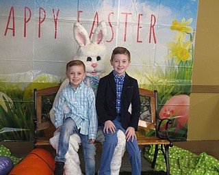 Neighbors | Zack Shively.The Evening with the Easter Bunny kicked off the spring season at Boardman Park. The event took place at the Lariccia Family Community Center, and they set up activities in both main rooms. Pictured, Danny and Jake Milush posed for a photo with the Easter Bunny in the community center.