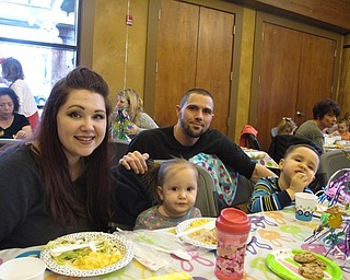 Neighbors | Zack Shively.Boardman Park provided dinner and a movie for the families that attended the Evening with the Easter Bunny. They watched Easter movies while eating foods like salad and carrots. Pictured are, from left, Julia Myers, Karina Fox, Robert Fox and Bobby Fox enjoying their dinner.