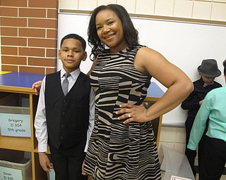 Neighbors | Zack Shively.Austintown Intermediate School has the WATCH D.O.G.S. program, which gives the fathers and children time to connect. The PTA wanted to give the mothers a night with their children, so they created the Starry Night dance. Pictured are Bryttanie Burton and her son Jose Crespo at the dance.