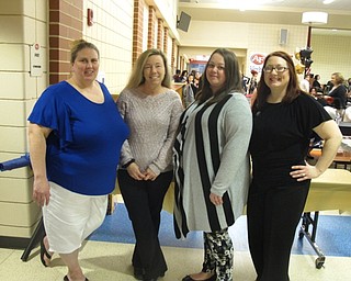 Neighbors | Zack Shively.The AIS PTA organized the "Starry Night" dance for the mothers and students. They provided a dinner donated by Barry Dyngles and a photo booth from Images by Mandy. Pictured are some of the PTA, from left, Patty Ritty, Kelly Waltwmire, Liz Himes and Katie Bushling.