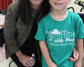 Neighbors | Abby Slanker.Hilltop Elementary School kindergartener Joseph Maszczak and his mom Anna had fun together as they celebrated the school’s annual Muffins With Mom on April 20.