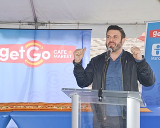 Adam Richman, celebrity chef, speaks at the grand-opening ceremony of the new GetGo gas station/cafe/market at 133 Boardman-Poland Road in Boardman on Thursday May 3, 2018. 

Photo by Scott Williams - The Vindicator