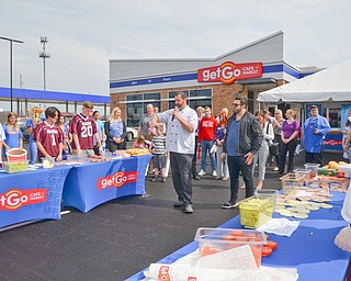 Members of the Boardman High School Lacrosse team participated in a "Sub Off" challenge, racing each other to make the most subs in three minutes at the grand-opening ceremony of the new GetGo gas station/cafe/market at 133 Boardman-Poland Road in Boardman on Thursday May 3, 2018.  Members from the team were #9 - Devin Whitaker, #50 - Cody Geary, #55 - Clayton Wehr, #25 - Jett Ventresco, #1 - Colin Frost, and #20 - Mitchell Brunko. 

Photo by Scott Williams - The Vindicator