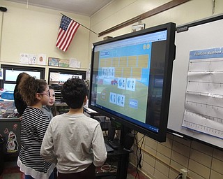 Neighbors | Zack Shively.Market Street Elementary hosted their Math Night at the school. The night aimed to make a connection between the classroom and the students' homelives. Pictured, third-grade students played math games on the computer in Donna Fortunato's classroom.