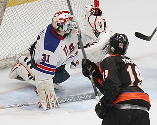 William D. Lewis The Vindicator Phantoms( Chase Grescock(19) scores of USA goalie Cameron Rowe(31) during 1rst period action 5-5-18 at Covelli.