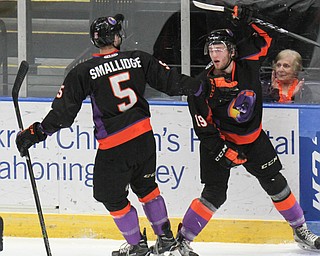 William D. Lewis The Vindicator Phantoms( Chase Grescock(19) gets congrats from Jason Smallidge(5) after scoring during 1rst period action 5-5-18 at Covelli.