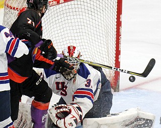 William D. Lewis The Vindicator Phantoms Samuel Salonen(71) shoots of USA goalie Cameron Rowe(31).