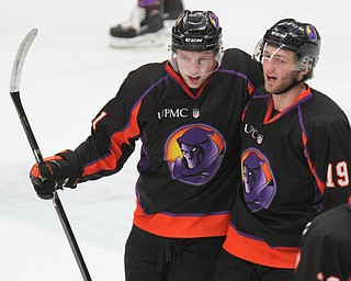 William D. Lewis The Vindicator Phantoms Michael Regush(21), left, and Chase Grescock(19) celebrate after Regush scored during 1rst period 5-5-18.