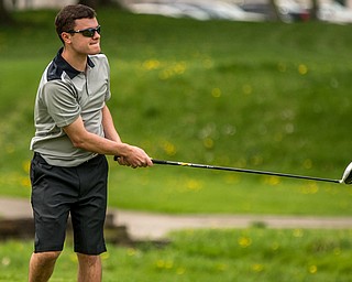 THE VINDICATOR | DIANNA OATRIDGEÊ Luke Nord, 16, of Poland, reacts after teeing off on Hole no. 1 at Pine Lakes Golf Club during the Greatest Golfer of the Valley qualifier on Sunday..