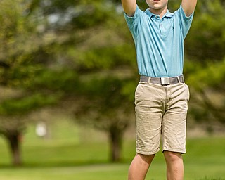 THE VINDICATOR | DIANNA OATRIDGEÊ Anthony Cisaro, 11, of Niles, reacts after leaving his putt short on the No. 7 green at Pine Lakes Golf Club in Hubbard on Sunday during the Greatest Golfer of the Valley qualifier.