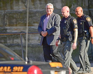 WARREN, OHIO - MAY 7, 2018: Former Niles Mayor Ralph Infante is escorted, by Sheriffs deputies, out of the Trumbull County Courthouse to the Trumbull County Jail in handcuffs after being found guilty on twenty two charges, Monday night. DAVID DERMER | THE VINDICATOR