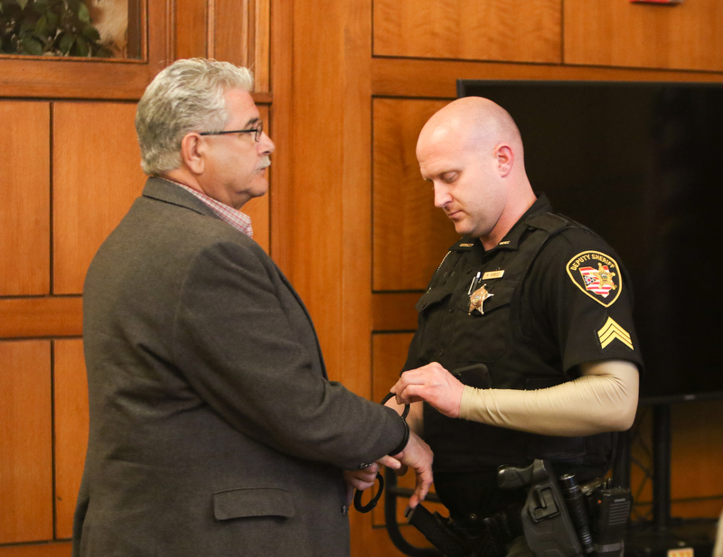  ROBERT K.YOSAY  | THE VINDICATOR..And with a click former mayor ralph infant is taken into custody --- The jury in the Ralph Infante corruption trial have found the former Niles mayor guilty of 22 of the 32 charges he faced, including the most serious charge, engaging in a pattern of corrupt activity...Infante, 62, did not appear to show any reaction to the verdicts. Sentencing is set for 10 a.m. Friday.....-30-