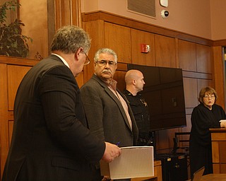 Ralph Infante stands next to his attorney, John Juhasz and a deputy as Judge Patricia Cosgrove stand nearby as jurors were about to head back to the jury room to continue deliberations late Monday.