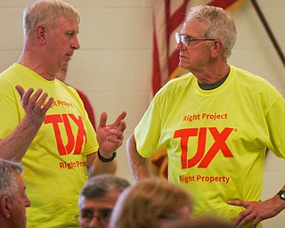 William D. Lewis The Vindicator Harvey Lutz, left, and Don Koches, both of Lordstown  and supporters of the TJX project, talk during a zoning meeting at the Lordstown Administration building Tuesday.