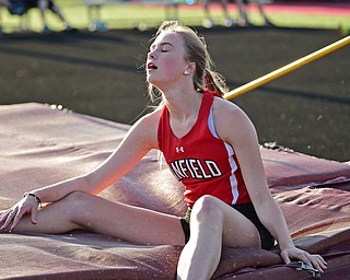 BOARDMAN, OHIO - MAY 8, 2018: Canfield's Morgan Schneider shows her frustration after knocking the bar off during the girls high jump during the AAC Red Tier Track Championship at Boardman High School, Tuesday night. DAVID DERMER | THE VINDICATOR