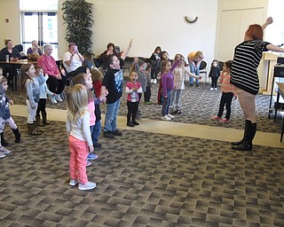 Neighbors | Zack Shively.The Austintown library had their weekly "Gotta Move Story Time" on April 5 in the large meeting room. Mallory Wiand led the children in several dances and movements.