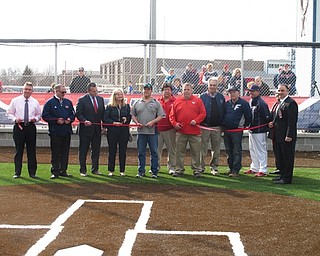 Neighbors | Zack Shively.Representatives from the Austintown Fitch High School, school board and baseball team cut the ribbon on Richard L. Coppola Field. Pictured are, from left, Fitch Principal Christopher Berni, Trustee Jim Davis, Board President Don Sherwood, Board Vice President Robin Krempasky, board member Harold Porter, Director of Facilities Richard Zimmermann, Athletic Director Lewis VanHoose, former coaches Rich Coppola and Wally Ford, current coach Joe Paris, Treasurer A.J. Ginnetti and Superintendent Vincent Colaluca.
