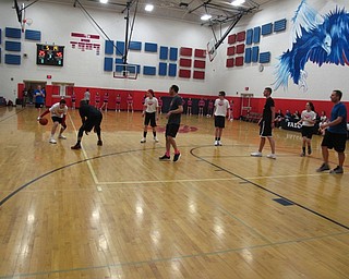 Neighbors | Zack Shively.The Students Versus Staff basketball game is an annual event at the middle school. They had a full game with four quarters, referees, cheerleaders, concessions, programs and a scoreboard.