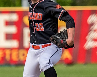 THE VINDICATOR | DIANNA OATRIDGEÊ Howland's Hayden Parker delivers a pitch against Cardinal Mooney at Cene Park on Wednesday during Division II Sectional Final action. Mooney won 11-2.