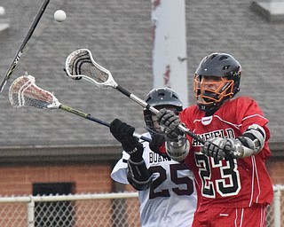 William D. Lewis The Vindicator Canfield's (23) passes around Boardman's (25)..