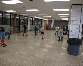 Neighbors | Zack Shively.The Stadium Drive Ice Cream Social featured a section in the cafeteria where the students could dance and run around with their friends from school. One of the dads at the event provided his abilities as a DJ for the children.