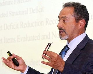Michael Abouserhal, who was retained by the Jamael Tito Brown administration to provide an analysis of Youngstown’s current and projected financial condition, speaks during a Monday meeting at the Covelli Centre.