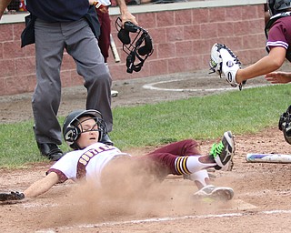 Maddie Helon (2) of South Range falls into home plate after being tagged in the mask by Waterloo catcher Amber Cieplinski (17) during their semi finals matchup on Monday night. Dustin Livesay  |  The Vindicator  5/14/18  Canfield