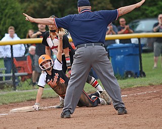 Makenzy Capouellez (4) of Springfield asks the official for a time out after sliding safely into third base under the tag by Girard's Lorren Alejars (5) during Monday evenings semi-finals matchup at South Range High School.  Dustin Livesay  |  The Vindicator  5/14/18  South Range High School, Canfield.