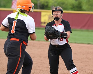 Emma Markulin (8) of Girard lags out Cassie Bacon (1) on the first baseline during Monday evenings semi-finals matchup at South Range High School.  Dustin Livesay  |  The Vindicator  5/14/18  South Range High School, Canfield.