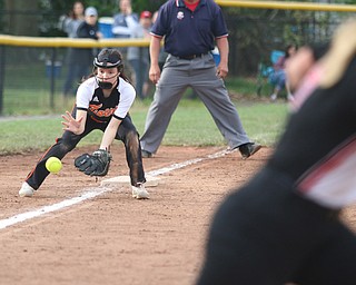 Springfield's Mya Duskey (5) fields a ground ball during Monday evenings semi-finals matchup against Girard at South Range High School.  Dustin Livesay  |  The Vindicator  5/14/18  South Range High School, Canfield.